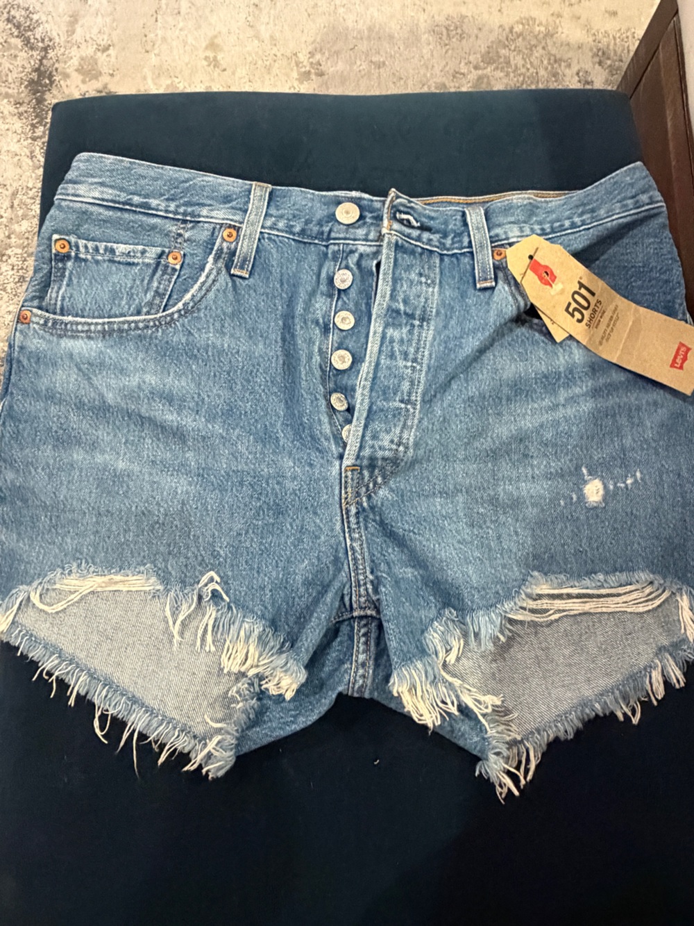 Levi's Light Blue High-Rise 501 Distressed Denim Shorts